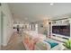 Open concept living room with view into kitchen and dining area at 13043 Pennybrook Dr, Riverview, FL 33579
