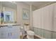 Clean bathroom with granite vanity, shower, and toilet at 13043 Pennybrook Dr, Riverview, FL 33579