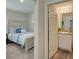 Hallway with view into a bedroom and bathroom at 13043 Pennybrook Dr, Riverview, FL 33579