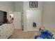 bedroom with double doors to closet and adjacent room at 13043 Pennybrook Dr, Riverview, FL 33579