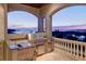 Luxury outdoor kitchen with granite countertops at 1227 Osowaw Blvd, Spring Hill, FL 34607