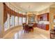 Bright breakfast nook with built-in cabinetry and large windows at 1227 Osowaw Blvd, Spring Hill, FL 34607