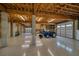 Large unfinished basement garage with high ceilings and multiple garage doors at 1227 Osowaw Blvd, Spring Hill, FL 34607