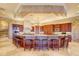 Large kitchen with island, granite countertops, and ample cabinetry at 1227 Osowaw Blvd, Spring Hill, FL 34607