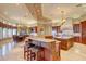 Open kitchen with large island and breakfast bar at 1227 Osowaw Blvd, Spring Hill, FL 34607