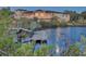 Luxury waterfront home with private dock at sunset at 1227 Osowaw Blvd, Spring Hill, FL 34607