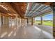 Unfinished basement garage offering high ceilings and scenic views at 1227 Osowaw Blvd, Spring Hill, FL 34607