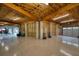 Unfinished basement garage with high ceilings and epoxy flooring at 1227 Osowaw Blvd, Spring Hill, FL 34607