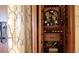 Spacious wine cellar with ample storage for wine bottles and accessories at 1227 Osowaw Blvd, Spring Hill, FL 34607