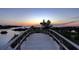 Wooden bridge leading to waterfront sunset views at 1227 Osowaw Blvd, Spring Hill, FL 34607