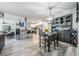 Cozy dining area with a dark wood table and built-in shelving at 2289 Republic Dr, Dunedin, FL 34698