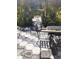 Relaxing patio with pergola, pond view, and outdoor seating at 1401 W Spencer St, Plant City, FL 33563