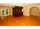 Hardwood flooring in an open concept living area with back patio access at 10799 Harborside Dr, Largo, FL 33773