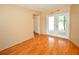Open-concept living room and kitchen with hardwood floors at 10799 Harborside Dr, Largo, FL 33773