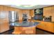 Modern kitchen with stainless steel appliances and granite countertops at 19828 Gulf Blvd # 401, Indian Shores, FL 33785