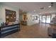 Bright and airy community lobby with comfortable seating and access to outdoor patio at 2585 Bay Berry Dr # 43D, Clearwater, FL 33763