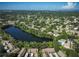 Community overview with lake and pool at 2585 Bay Berry Dr # 43D, Clearwater, FL 33763