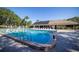 Relaxing community pool with plenty of seating at 2585 Bay Berry Dr # 43D, Clearwater, FL 33763