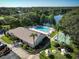 Community overview featuring pool, shuffleboard, and clubhouse at 2585 Bay Berry Dr # 43D, Clearwater, FL 33763