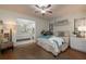 Spacious main bedroom with en-suite bathroom and relaxing coastal decor at 2585 Bay Berry Dr # 43D, Clearwater, FL 33763