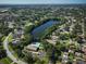 Aerial view of community near a lake at 2585 Bay Berry Dr # 43D, Clearwater, FL 33763