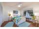 Bright bedroom with a comfortable bed, and a coastal-themed decor at 2585 Bay Berry Dr # 43D, Clearwater, FL 33763
