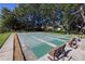 Well-maintained shuffleboard courts surrounded by lush landscaping at 2585 Bay Berry Dr # 43D, Clearwater, FL 33763