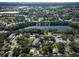 Aerial view of community with lake and surrounding area at 2585 Bay Berry Dr # 43D, Clearwater, FL 33763