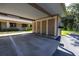 Covered carport parking with private storage unit at 2585 Bay Berry Dr # 43D, Clearwater, FL 33763