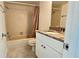 Cozy bathroom features a shower-tub combo and granite vanity at 6177 Sun Blvd # 108, St Petersburg, FL 33715