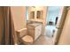 Cozy bathroom features a shower-tub combo and granite vanity at 6177 Sun Blvd # 108, St Petersburg, FL 33715