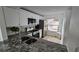Renovated kitchen showcasing granite counter tops and modern appliances at 6177 Sun Blvd # 108, St Petersburg, FL 33715