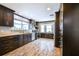 An elegant, modern kitchen features stainless appliances, wood cabinets and gorgeous countertops at 644 Bayshore Dr, Tarpon Springs, FL 34689