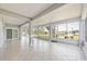Open lanai with tile floor and expansive water views at 644 Bayshore Dr, Tarpon Springs, FL 34689