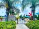 View of the community splash park with colorful water features, shade structures, and lush landscaping at 644 Bayshore Dr, Tarpon Springs, FL 34689