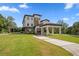 Luxury two-story house with a large front yard at 2316 Kent Pl, Clearwater, FL 33764