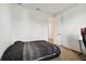 Simple bedroom with a double bed and neutral walls at 12235 Creek Preserve Dr, Riverview, FL 33579