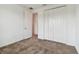 Spacious bedroom with neutral carpeting and ample closet space at 12235 Creek Preserve Dr, Riverview, FL 33579