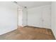 Bright bedroom with neutral walls and carpeting and two doors at 12235 Creek Preserve Dr, Riverview, FL 33579