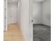 Bright hallway with tile floors and access to bedrooms at 12235 Creek Preserve Dr, Riverview, FL 33579
