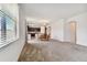 Bright dining room with wood table and four chairs, view into kitchen at 12235 Creek Preserve Dr, Riverview, FL 33579
