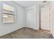 Bedroom with carpet, window, and closet at 12235 Creek Preserve Dr, Riverview, FL 33579