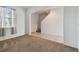 Spacious living room with neutral carpet and an open concept design at 12235 Creek Preserve Dr, Riverview, FL 33579