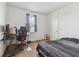 Bedroom with bed, desk and carpeted floor at 12235 Creek Preserve Dr, Riverview, FL 33579