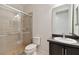 Bathroom with shower, toilet and dark vanity at 12235 Creek Preserve Dr, Riverview, FL 33579