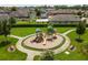 Community playground with slides and play structures at 12235 Creek Preserve Dr, Riverview, FL 33579
