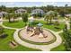 Community playground with slides and play structures at 12235 Creek Preserve Dr, Riverview, FL 33579