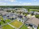 Aerial view of community featuring homes with solar panels at 12235 Creek Preserve Dr, Riverview, FL 33579
