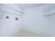 Laundry room with shelving for storage at 1170 Pine Ridge W Cir # C2, Tarpon Springs, FL 34688