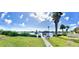 Private dock with boat lift, offering convenient access to the water at 644 Bayshore Dr, Tarpon Springs, FL 34689